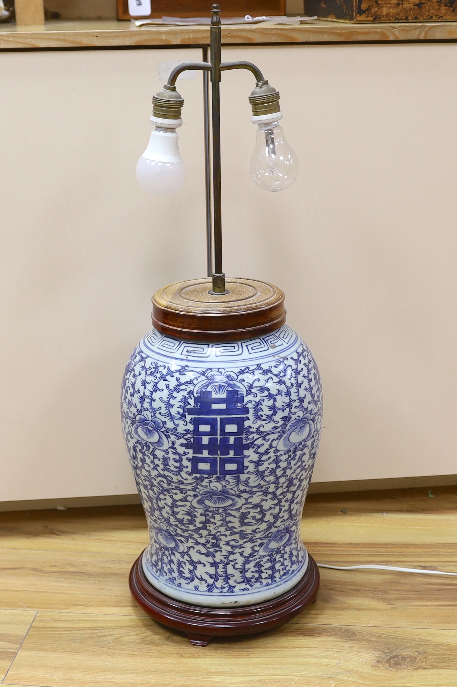 A large Chinese blue and white ‘shuangxi’ vase, now mounted as a lamp, overall 78cm high